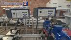 Automatic double head labeling machine for flat bottles Bauch Campos