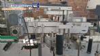 Automatic double head labeling machine for flat bottles Bauch Campos