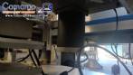 Automatic self-adhesive labeling machine for cylindrical bottles