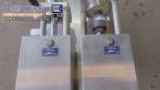 Semi-automatic pneumatic liquid filling machine with two nozzles