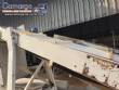 Inclined conveyor belt with talisca