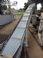 Inclined conveyor belt with talisca