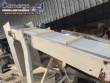 Inclined conveyor belt with talisca