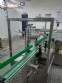 Linear filling machine with 12 filling nozzles