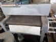 Conveyor oven with direct flame