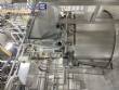Jacketed cookers with platform, pumps, and valves for toppings, syrups, fillings, and sauces.
