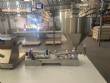 Cetro benchtop ultrasonic tube and pipe filling and dosing machine.