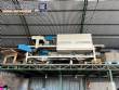 Automatic baling machine with shrink tunnel for bottles and jars in bales.