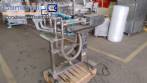 Filling machine with 2 nozzles for liquids and pilfer cap screwer