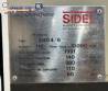 Sidel PET bottle blow molding machine, 4,000 bottles per hour.