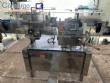 Packaging line with IMSB bung capper, Maqmundi labeler and accumulator table