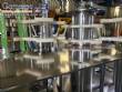 Gravimetric rotary filling machine in stainless steel with cabin