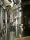 Gravimetric rotary filling machine in stainless steel with cabin
