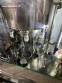 Gravimetric rotary filling machine in stainless steel with cabin