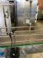Gravimetric rotary filling machine in stainless steel with cabin