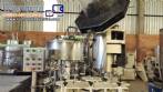 Monobloc rotary filling machine with 12 nozzles and screw capping machine