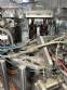 Automatic rotary dosing filling machine with sealer for Delgo cups, 3500 cups per hour.