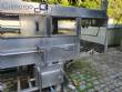Filling line for 10 and 20 liter gallon jugs with filling machine and rinser/washer.