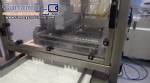 Stuffing machine for garlic bread