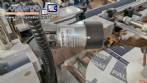 Automatic double-head labeling machine for cylindrical and flat bottles, Tudela, 3,000 labels per hour.