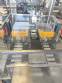Adhesive tape case sealer with safety enclosure and door sensors Strapack