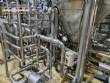 Stainless steel processing reactor tanks, 1140 liters, with pump valves.