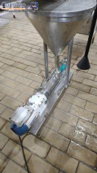 Netzsch positive displacement helical sanitary pump with feed hopper.