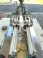 Stainless steel benchtop filling machine for liquids and viscous products