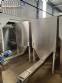 Stainless steel bagging storage silo with screw conveyor outlet