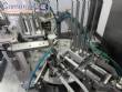 Automatic rotary filling, dosing, and sealing machine for communion cups and small cups.