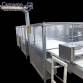 Distribution, phasing and feeding system for Cavanna packaging machines