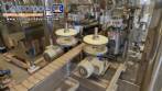 Automatic stainless steel labeling machine with two heads for Narita self-adhesive labels