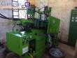 Factory line for the production of zipper sliders for clothing