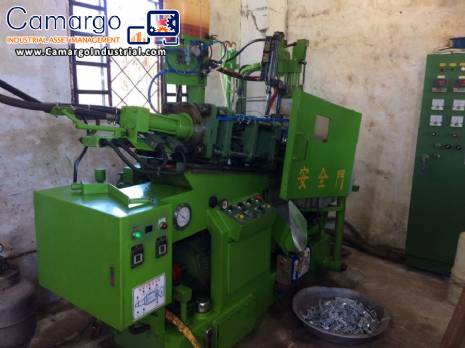 Factory line for the production of zipper sliders for clothing