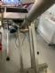 Inclined screw conveyor with stainless steel silo