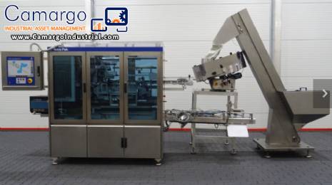 Automatic Tetra Cap Applicator 45 for helicap 27 caps and 1000 ml square Tetra Pak packaging.