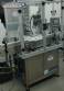 Rotary filling line for dropper bottles with Certo cylindrical self-adhesive labels