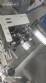 Rotary filling line for dropper bottles with Certo cylindrical self-adhesive labels