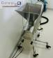 Capsule encapsulator, counter and polisher, capacity 22,000 capsules per hour.