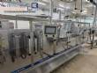 Horizontal stainless steel packaging machine for Profills stand-up pouch packaging.