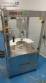 Rotmaq screw capping machine with cap positioning elevator