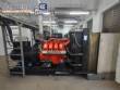 Electric generator with combustion engine