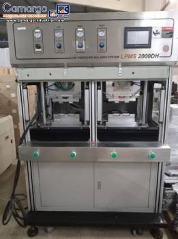 Production line for injection molding of batteries and plastic parts.