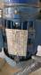 Labeling machine with steam sleeve tunnel and bottle baler