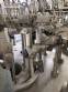 Zegla rotary filling machine with rinser and three-block capping system.