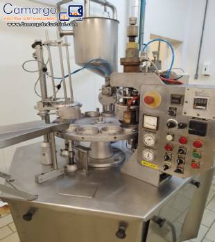 Stainless steel rotary filling and sealing machine for jars, cups, and bottles, Brasholanda, capacity 1,700 jars per hour.