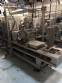 Automatic filling and sealing machine for gelatin cups, 12,000 units/hour.